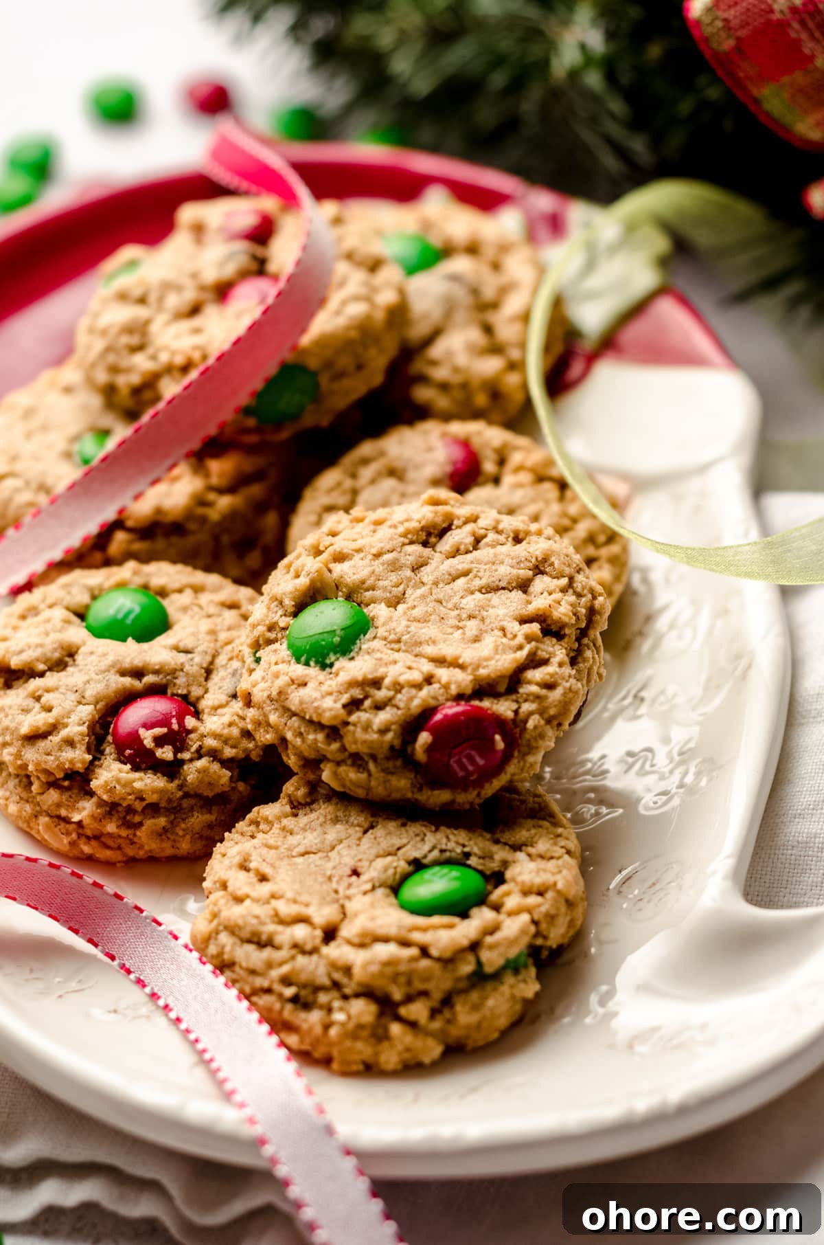 Ultimate Monster Cookie Recipe for Chewy, Loaded Cookies 7 christmas monster cookies on a santa plate