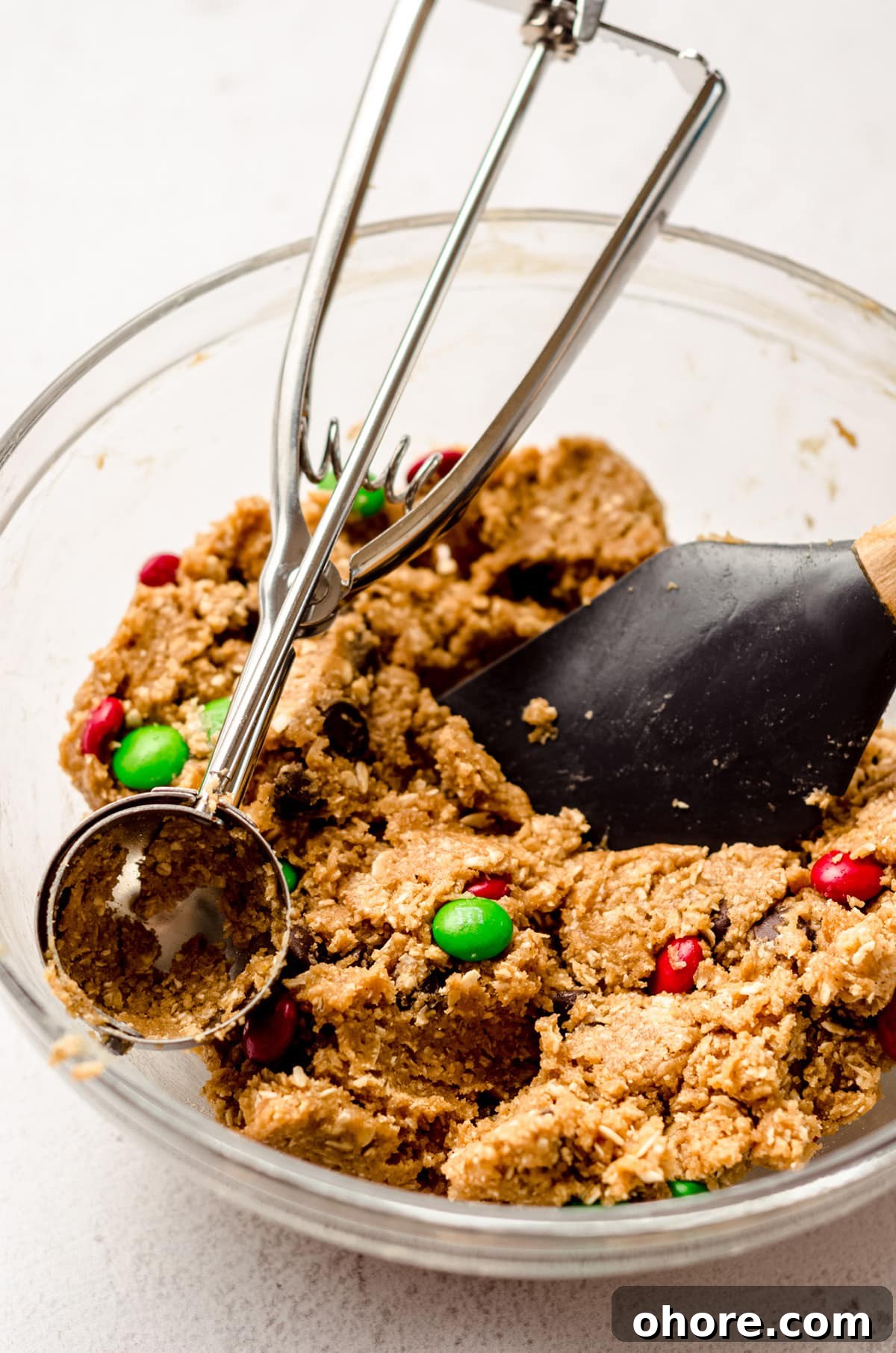 Ultimate Monster Cookie Recipe for Chewy, Loaded Cookies 10 christmas monster cookie dough in a bowl