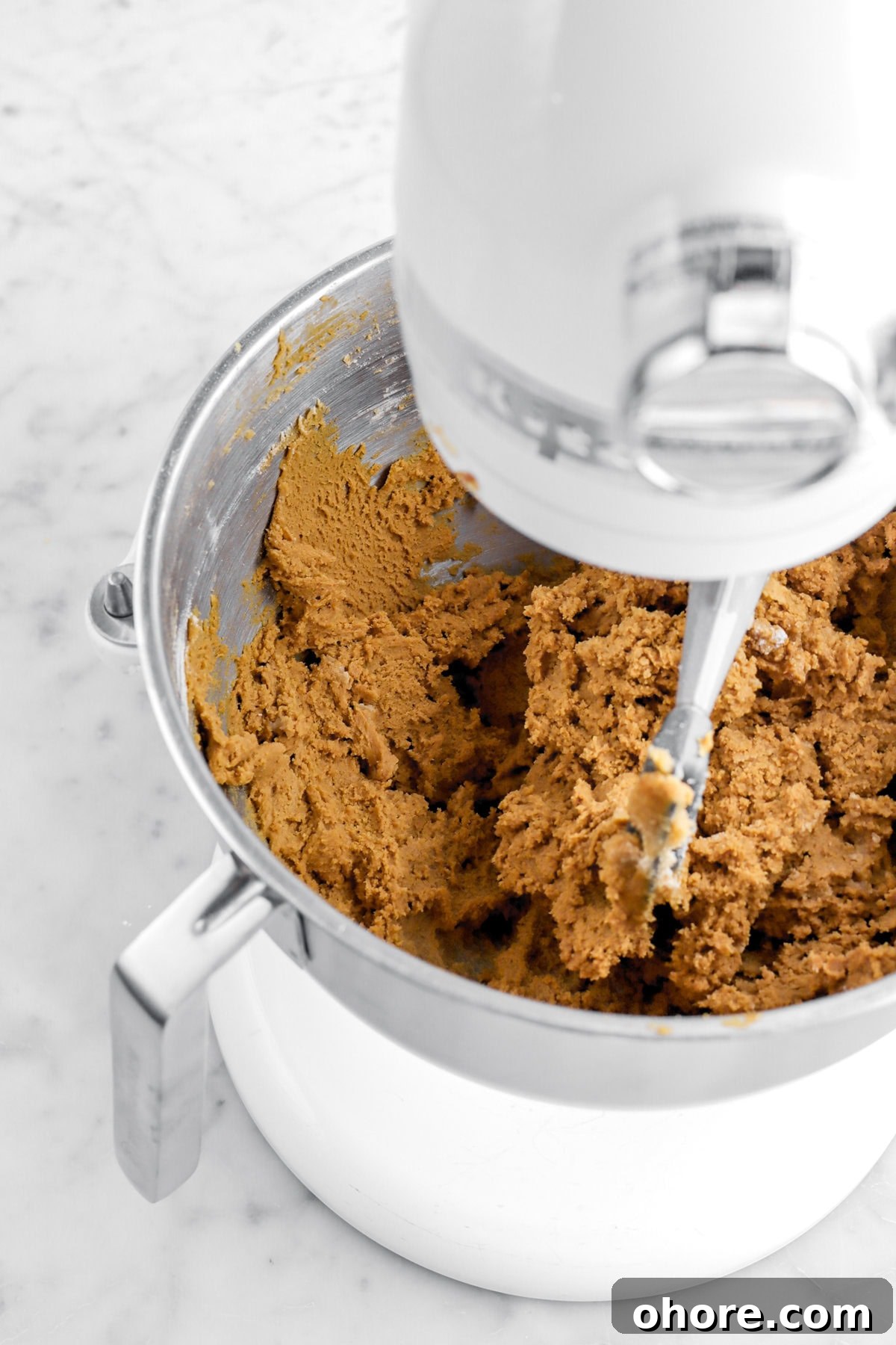 Gingerbread Sandwich Cookies Recipe for Holiday Parties 5 spiced cookie dough in stand mixer.