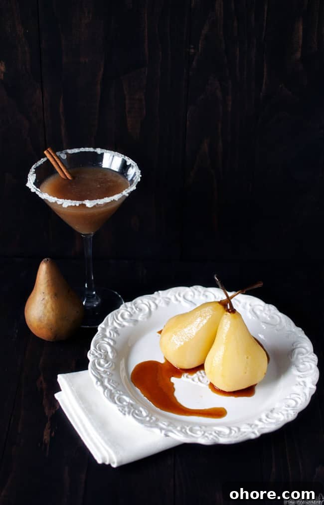 Citrus wine poached pears plated Poached pears on a plate