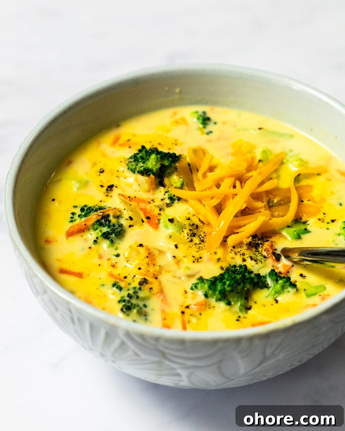 Creamy Broccoli Cheddar Soup Recipe for Cozy Comfort Meal 10 A side view of a bowl of broccoli cheddar soup.