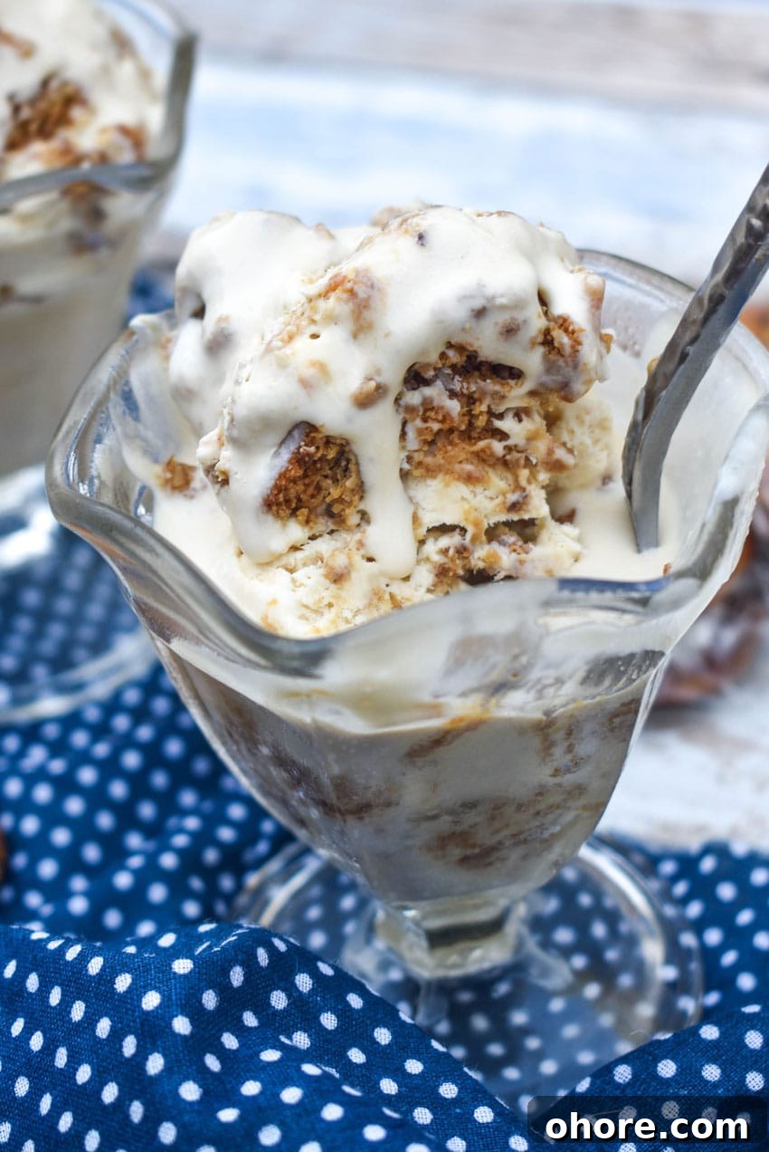 Homemade Oatmeal Cream Pie Ice Cream Recipe 7 a spoon sticking out of a glass dish filled with melting copycat little debbie oatmeal cream pie ice cream