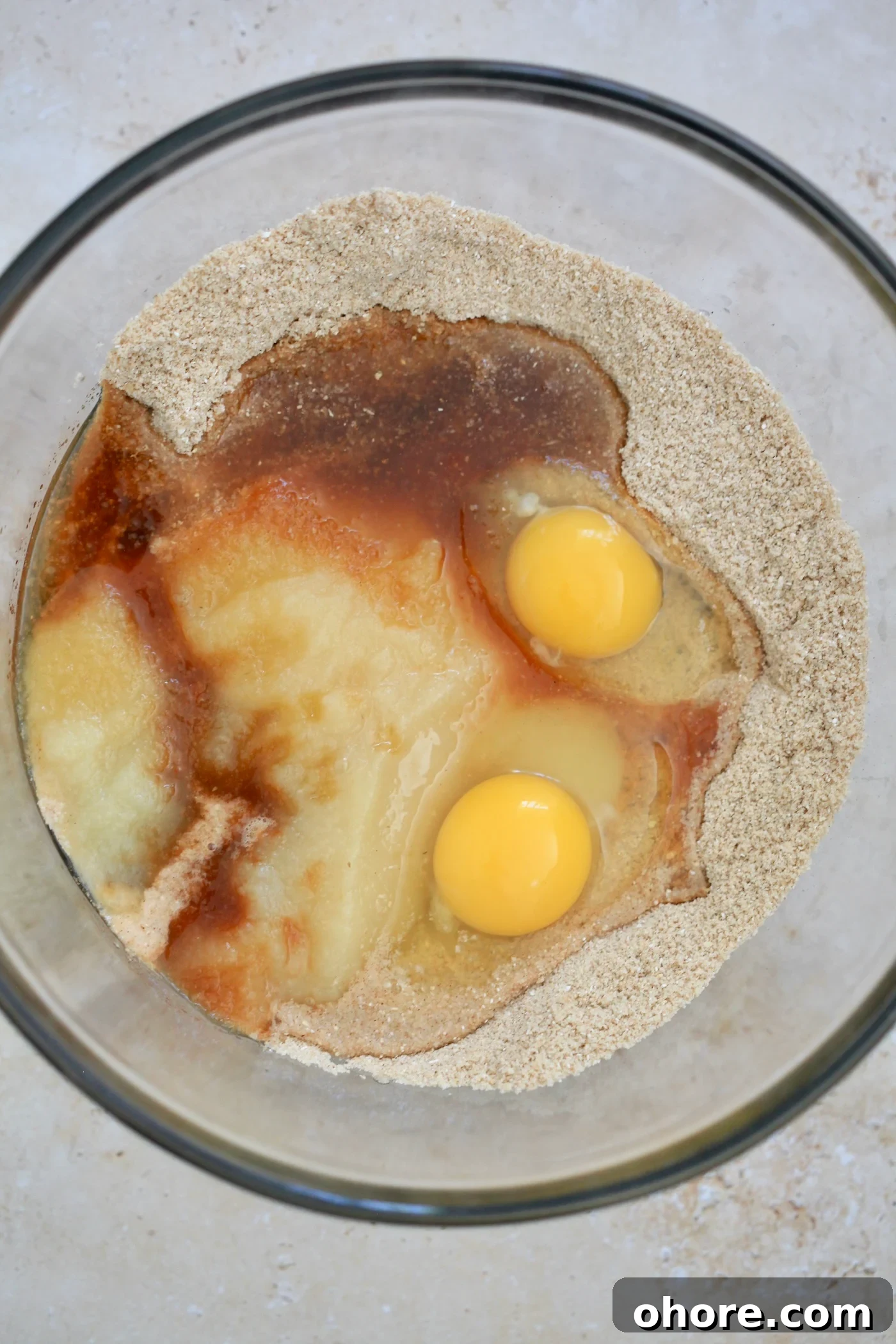 Almond Flour Apple Muffins: Fluffy, Gluten-Free Recipe 4 eggs and vanilla in mixing bowl.