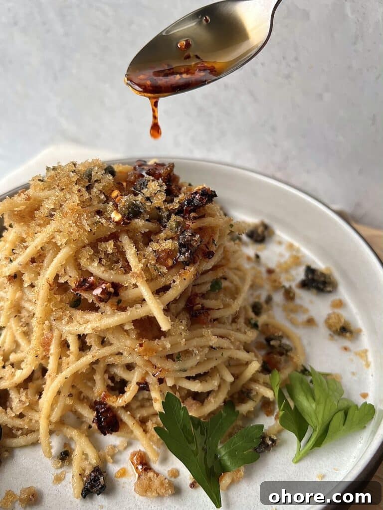 St. Joseph’s Spaghetti with Anchovies and Crispy Breadcrumbs 8 Drizzling spicy pepper oil over spaghetti ca muddica aka st joseph's spaghetti with breadcrumbs and anchovies.