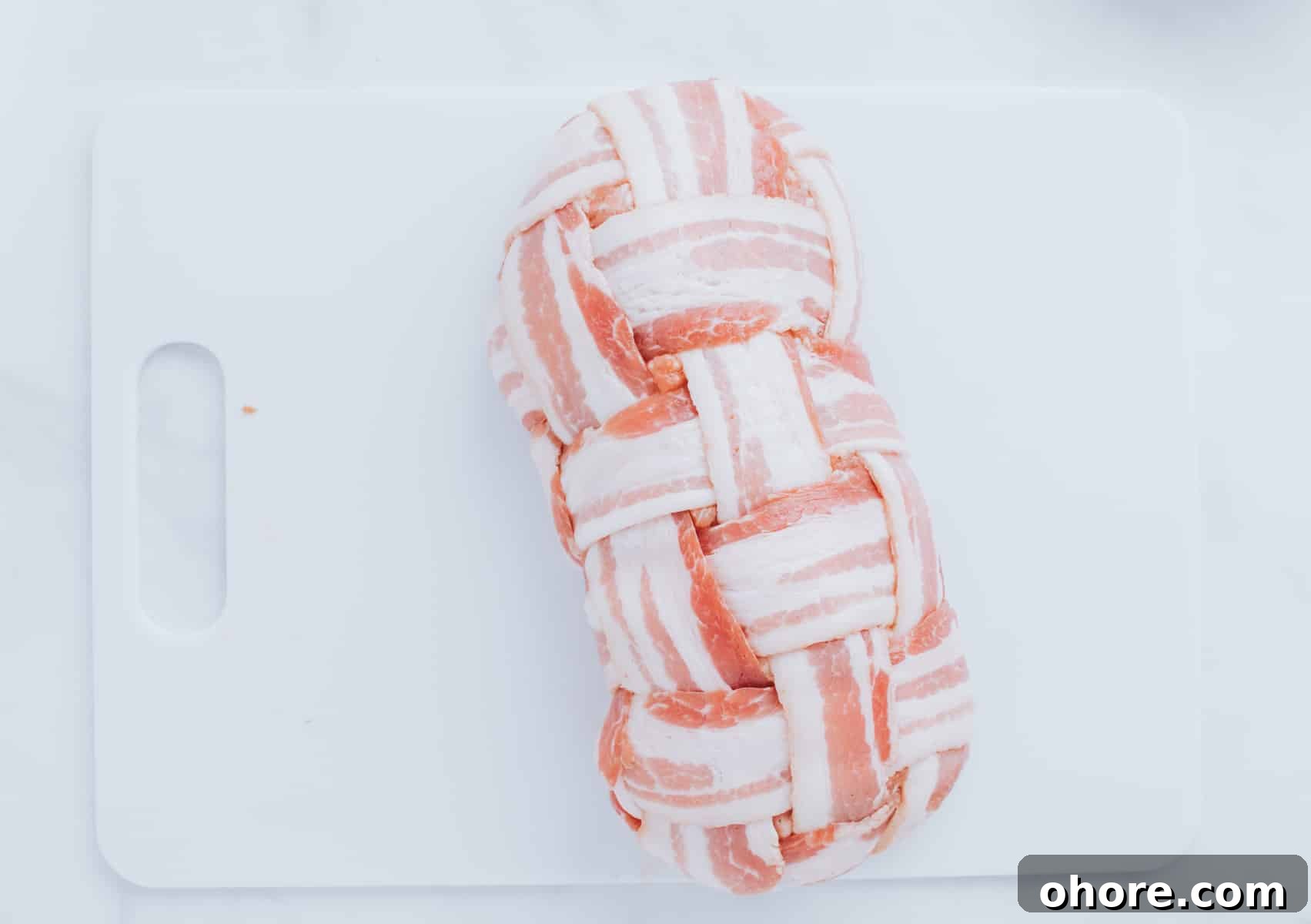 sausage fully wrapped by bacon