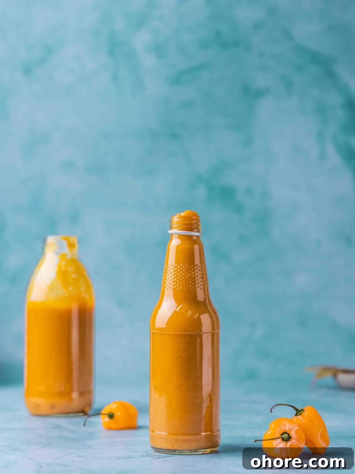 Mango Habanero Wing Sauce: Sweet, Spicy, Tangy Recipe 2 Sweet and spicy mango habanero sauce in a bottle.