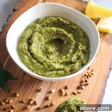 asparagus and basil made into a pesto in a small bowl.