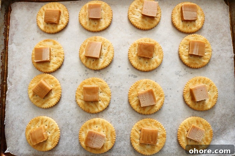 ritz crackers with caramel on sheet pan for ritz sandwich crackers. 