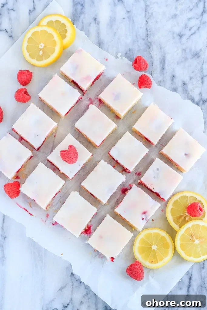 Raspberry Lemon Blondies Recipe with Tangy Glaze 4 Fast and easy to make, these chewy raspberry lemon blondies are just the right mix of tart and sweet - and will disappear way too quickly!