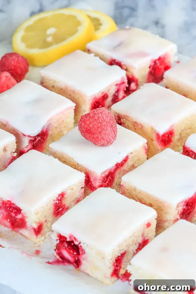 Raspberry Lemon Blondies Recipe with Tangy Glaze 5 Fast and easy to make, these chewy raspberry lemon blondies are just the right mix of tart and sweet - and will disappear way too quickly!