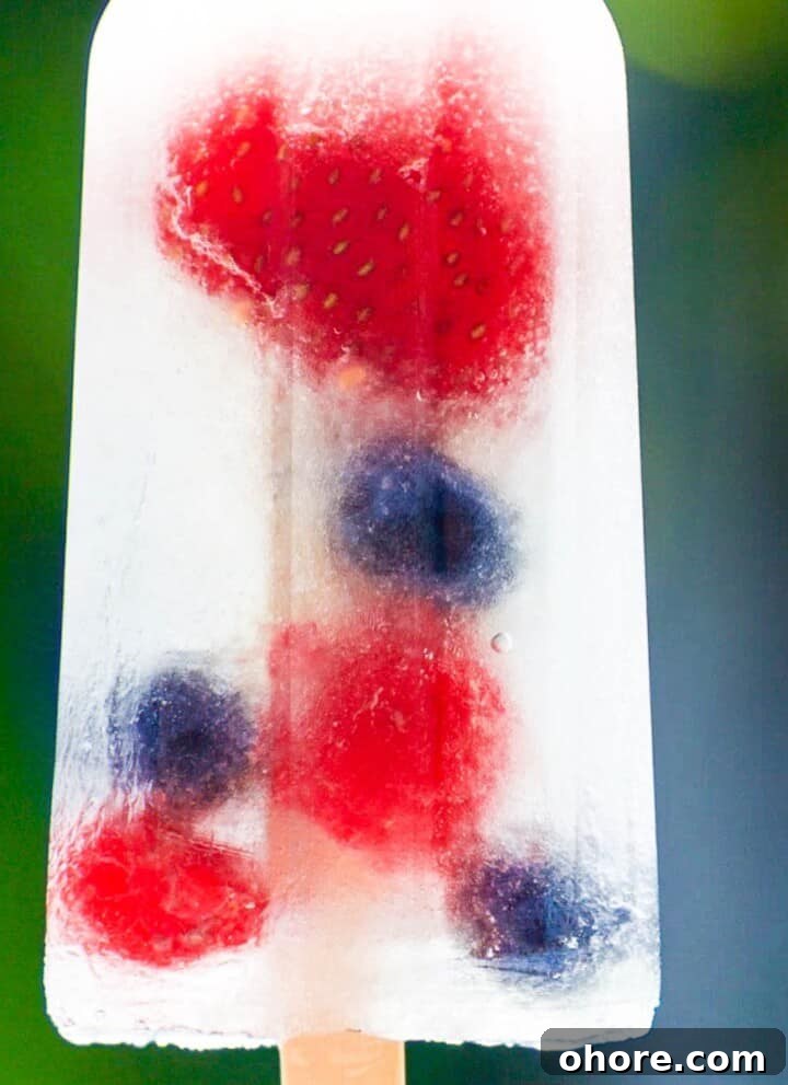Fruit popsicle with berries.