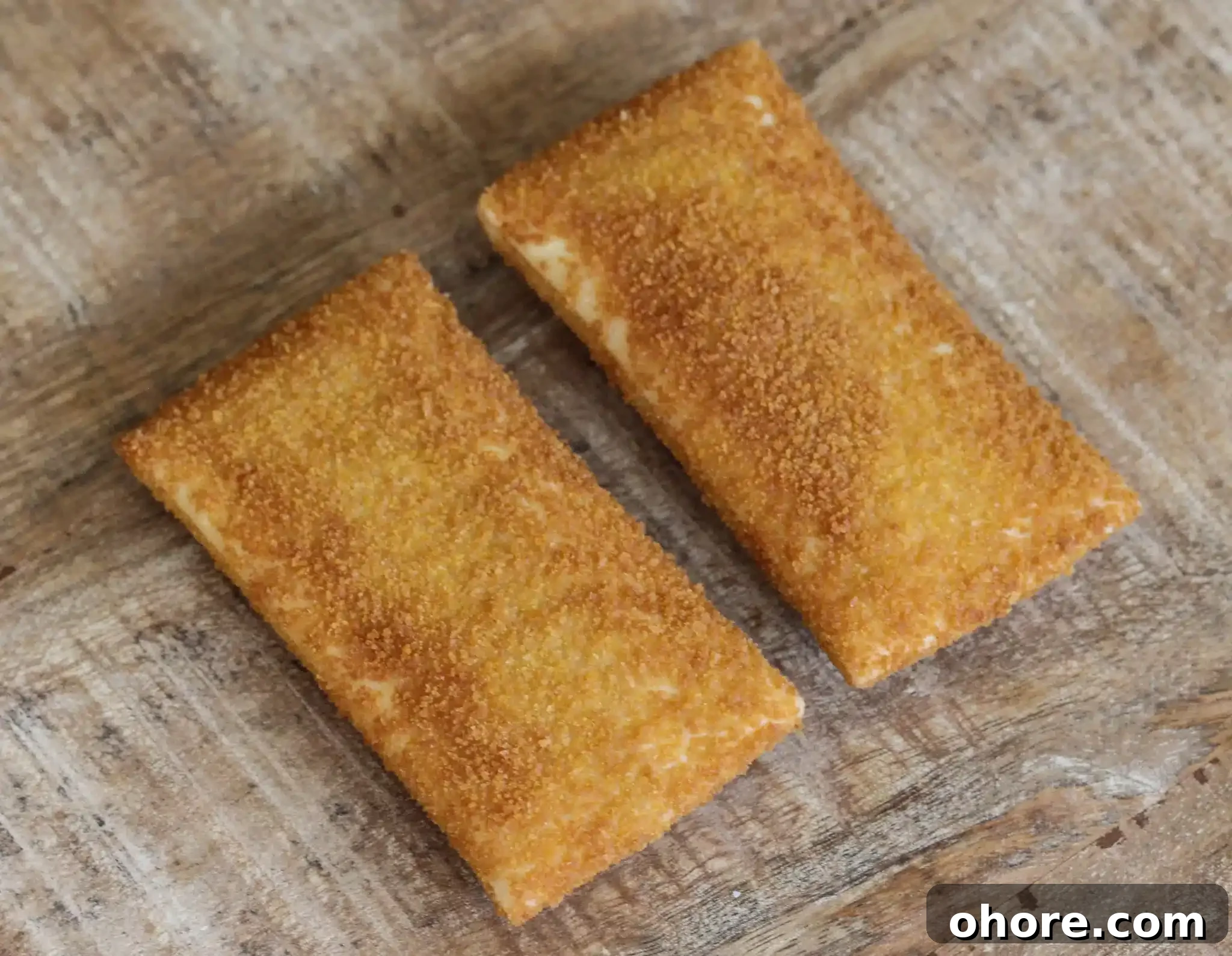 Close-up of a pair of kaassoufflé portions.