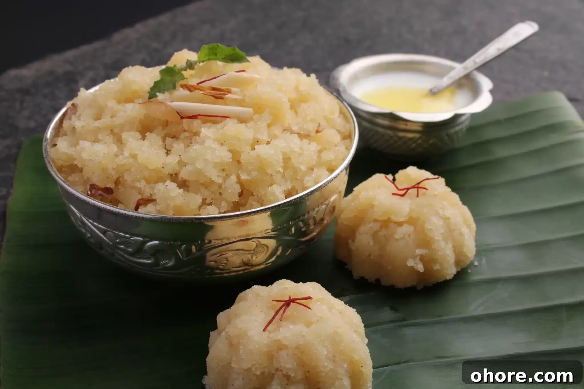 A serving of kesari baat resting on a palm tree.