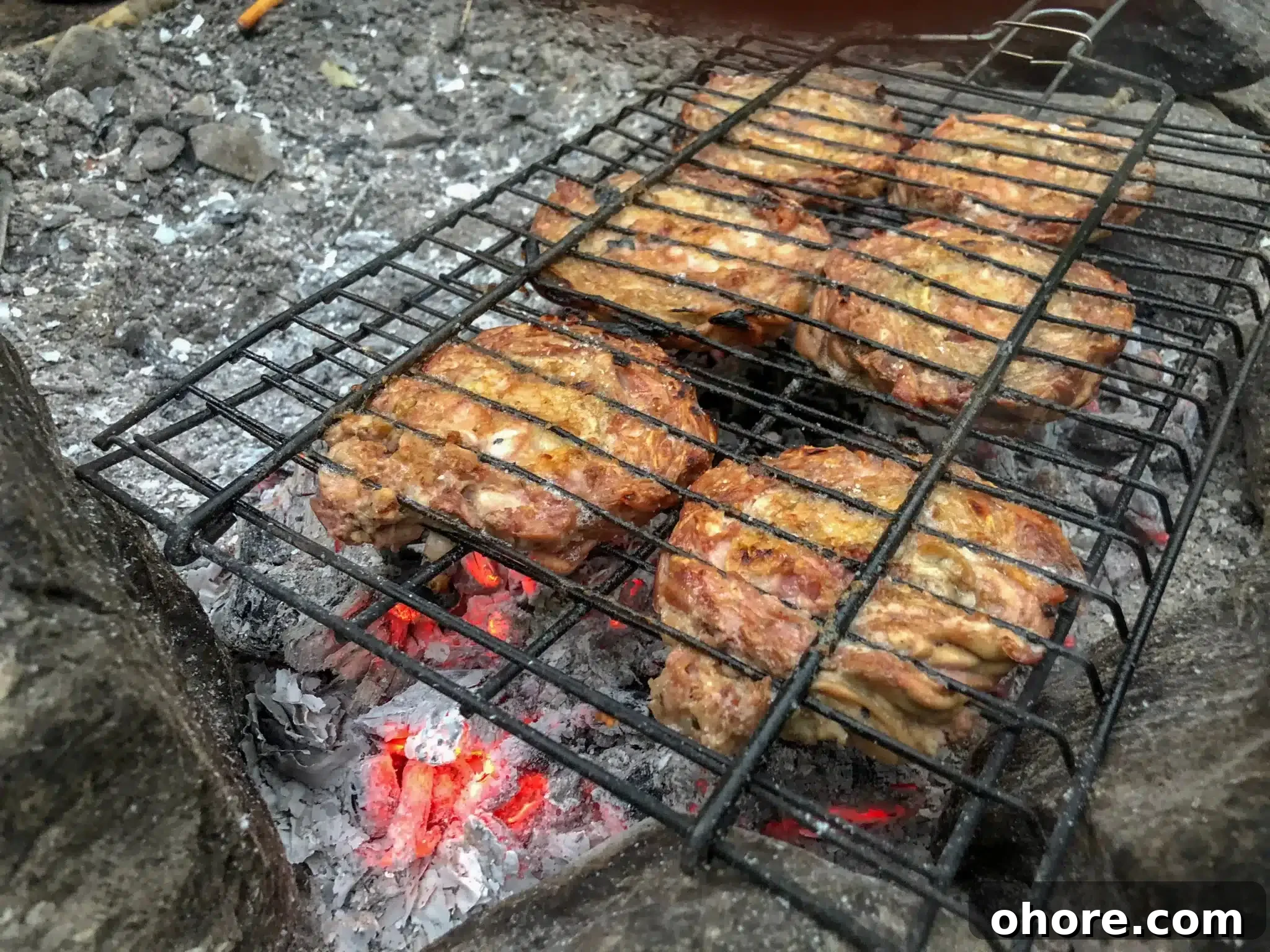 Kororeç grilled on fire.
