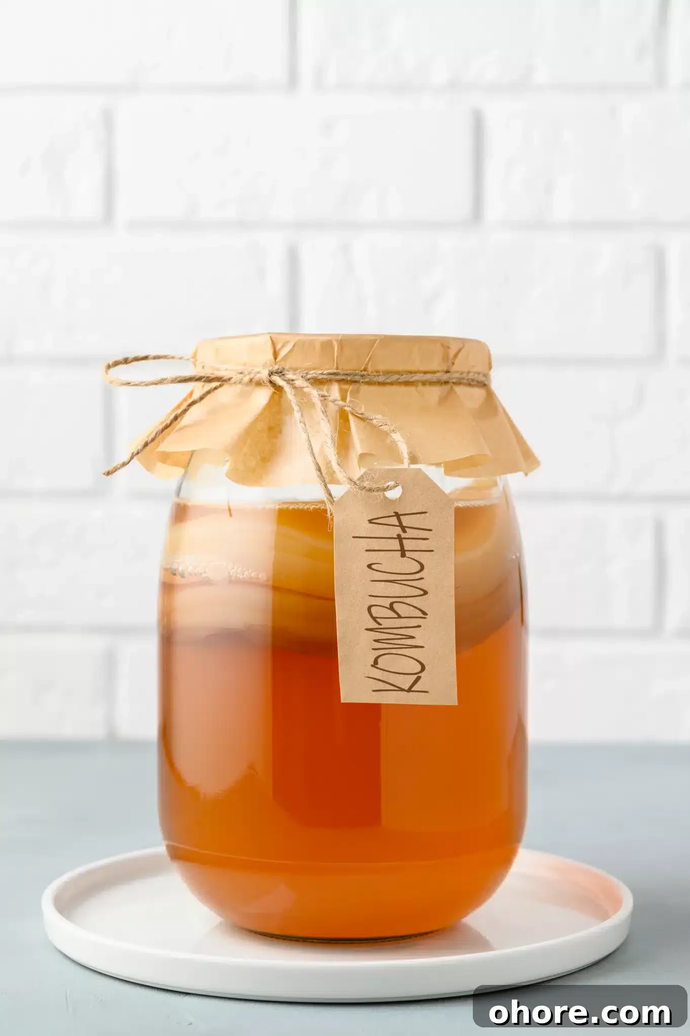 Macro shot of a jar containing kombucha.