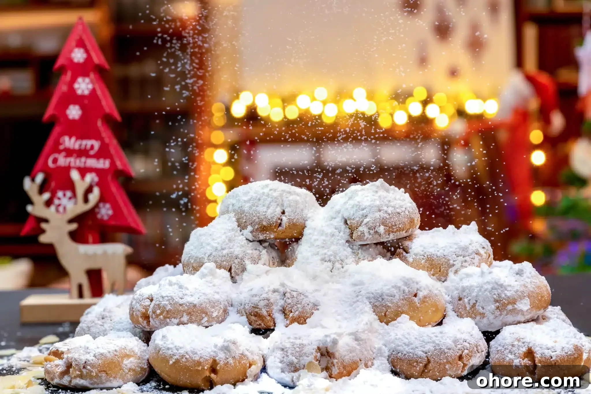 A Christmas background showcasing a pile of  kourabiedes.