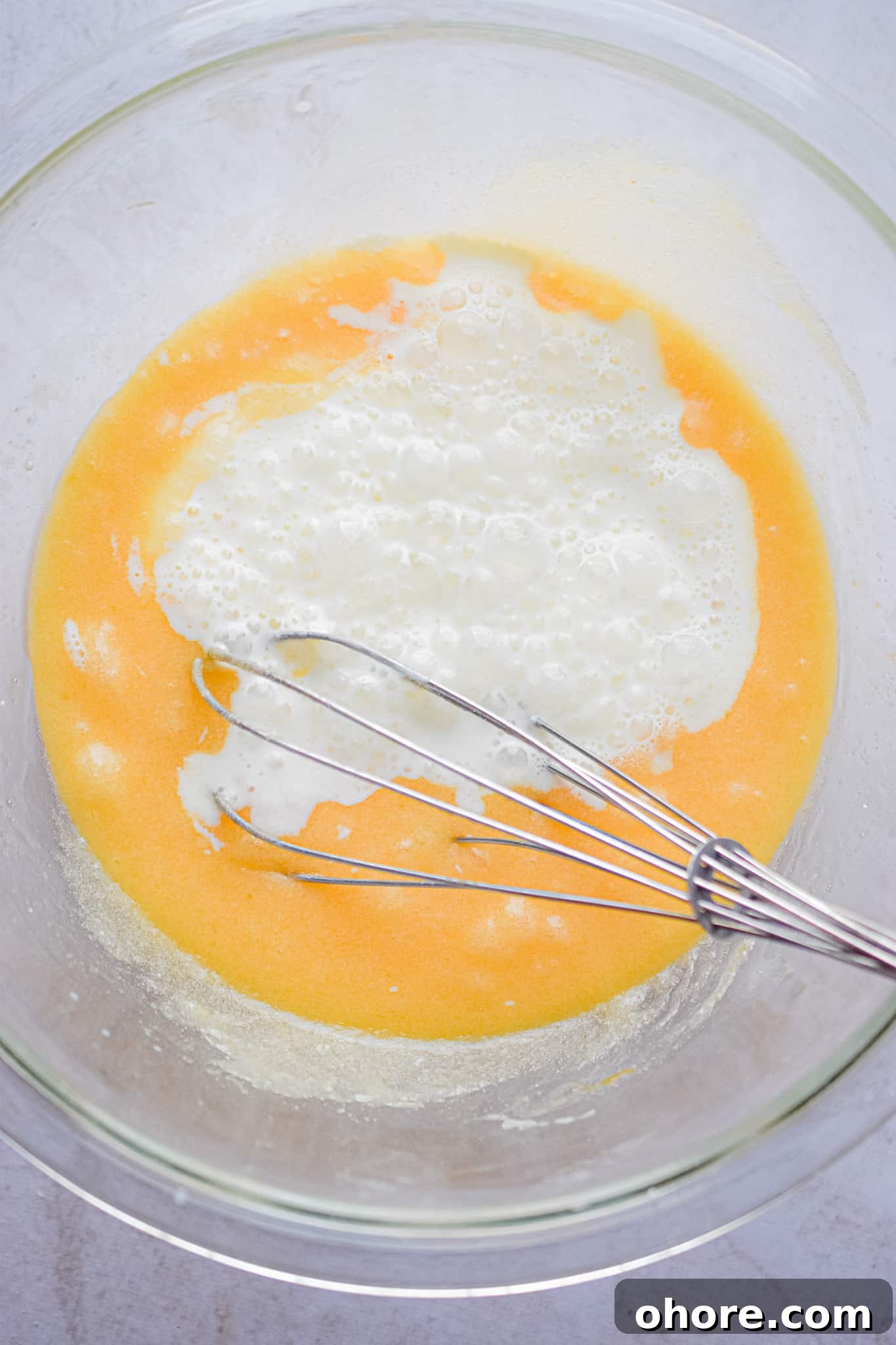 The milk is added to the bowl.