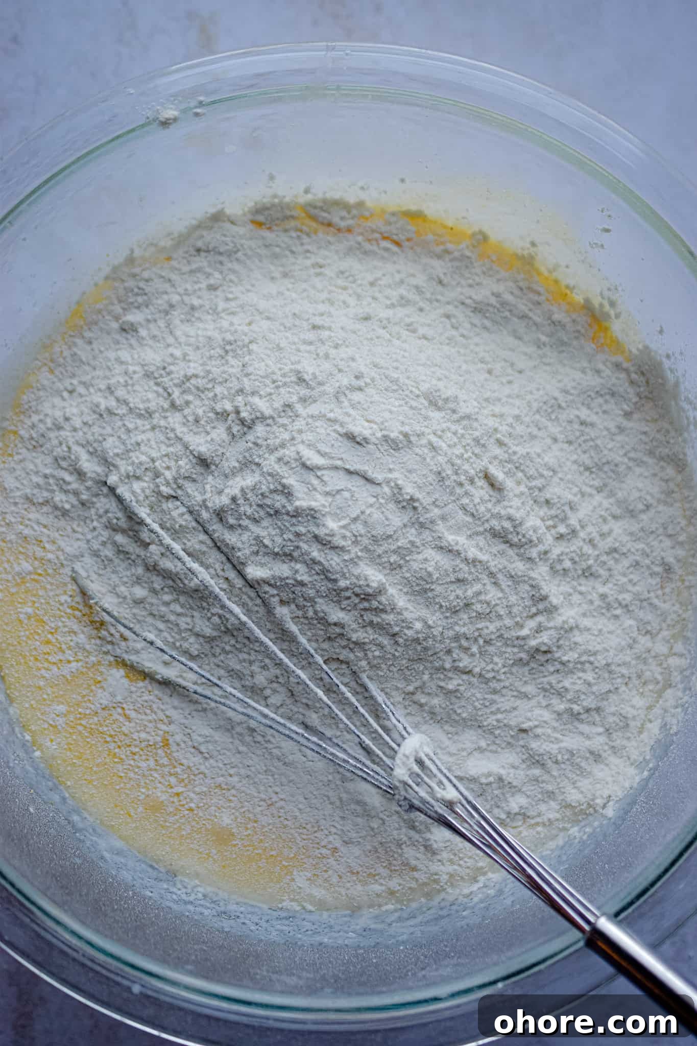 The dry ingredients are added to the wet ingredients.