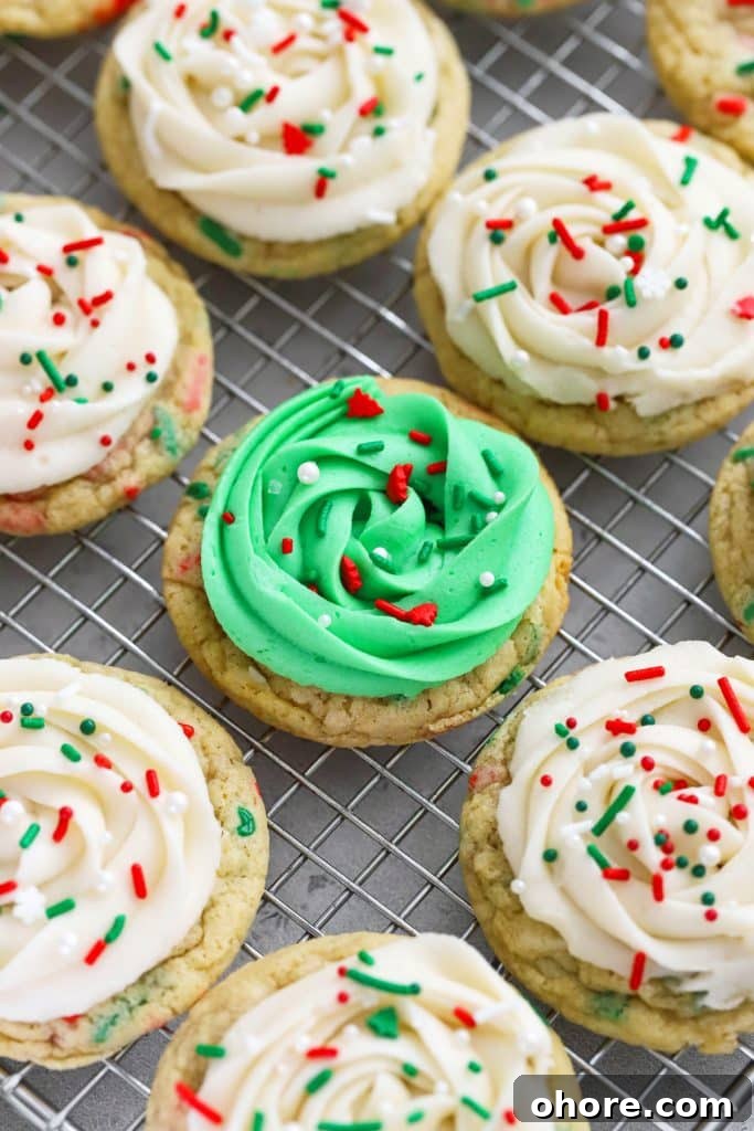 gluten-free christmas sugar cookies with green and white frosting and holiday sprinkles