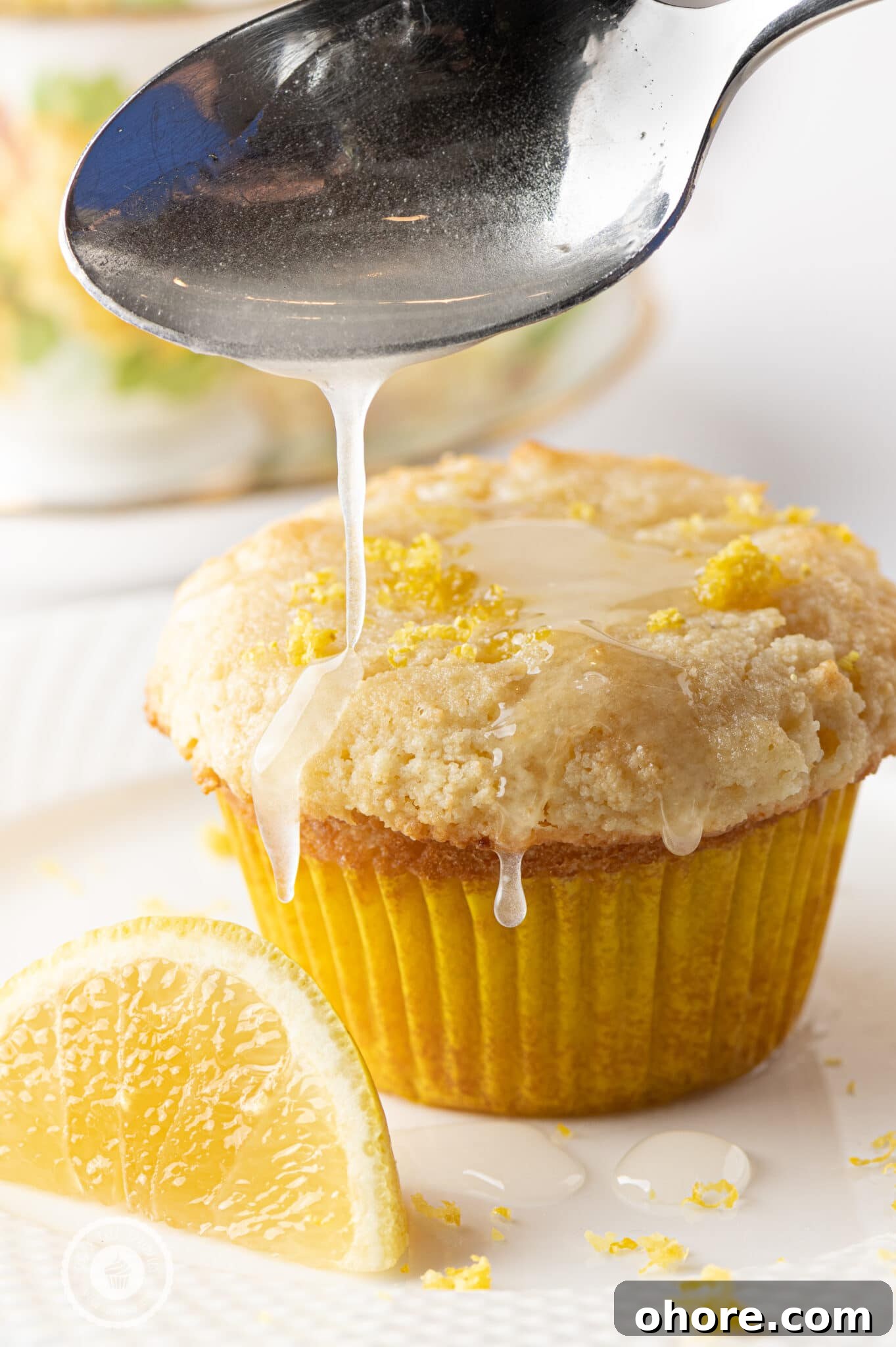 Keto lemon muffins with a sweet glaze, a refreshing low-carb muffin recipe perfect for breakfast on the go. 