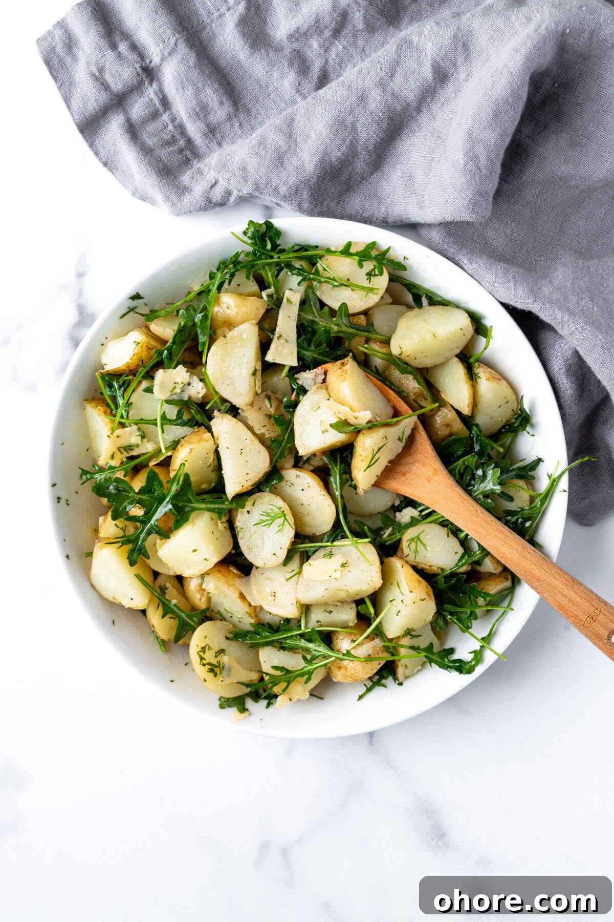 No Mayo Potato Salad in a white bowl.