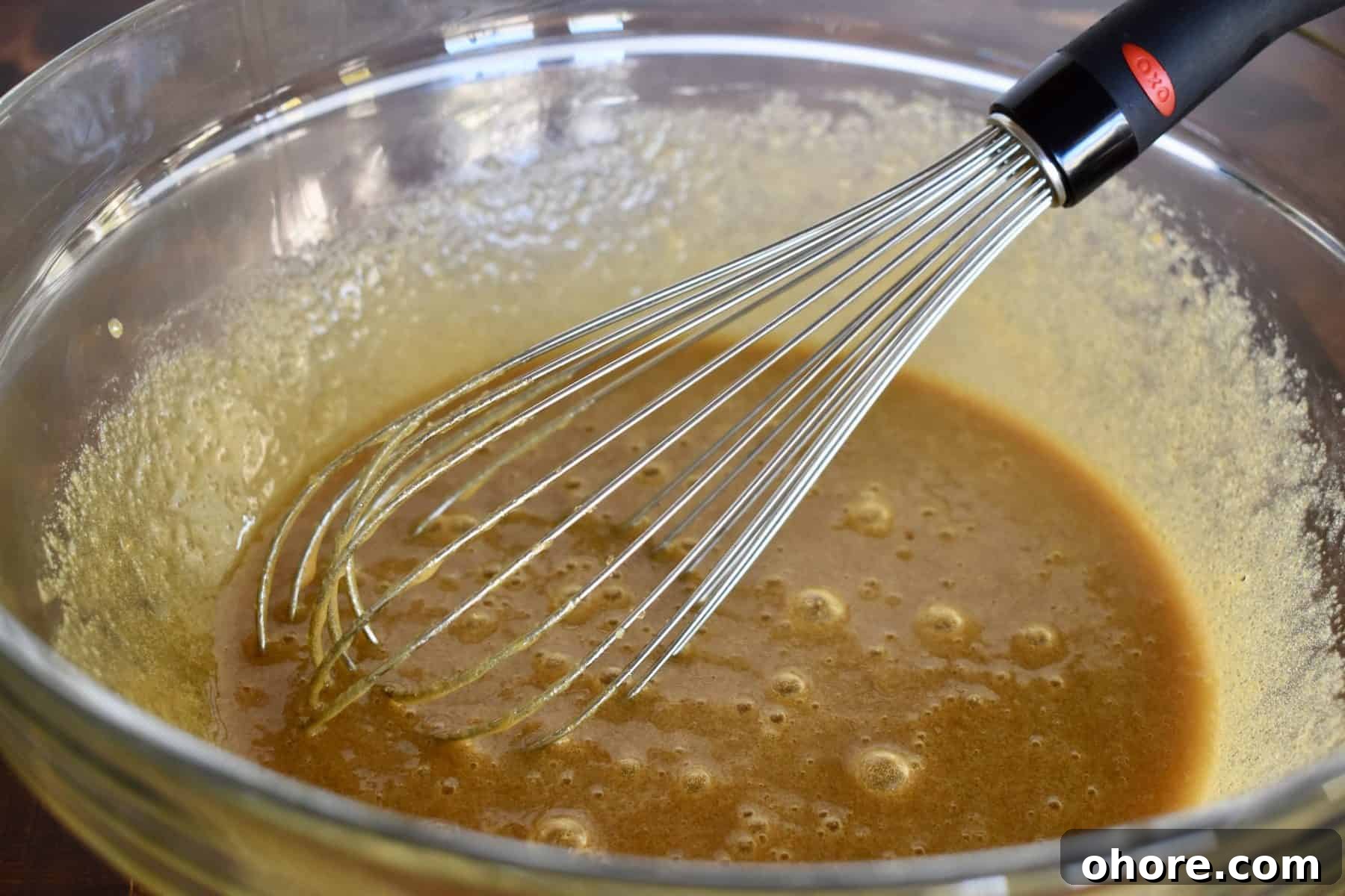 Milky Way Blondies with Caramel and Chocolate Delight 4 melted butter, brown sugar and eggs whisked together in a large bowl.