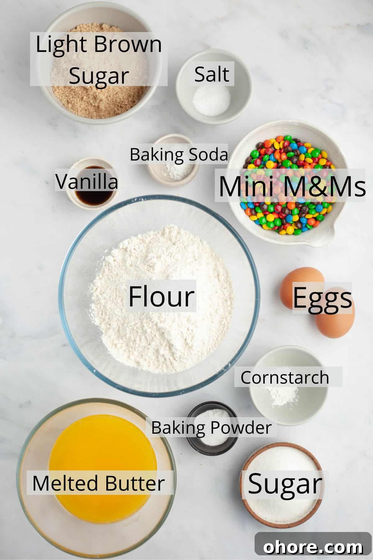 Soft Chewy Mini M&M Cookies — Small Batch Recipe 3 All the ingredients needed to make mini m&m cookies weighed out into small bowls.