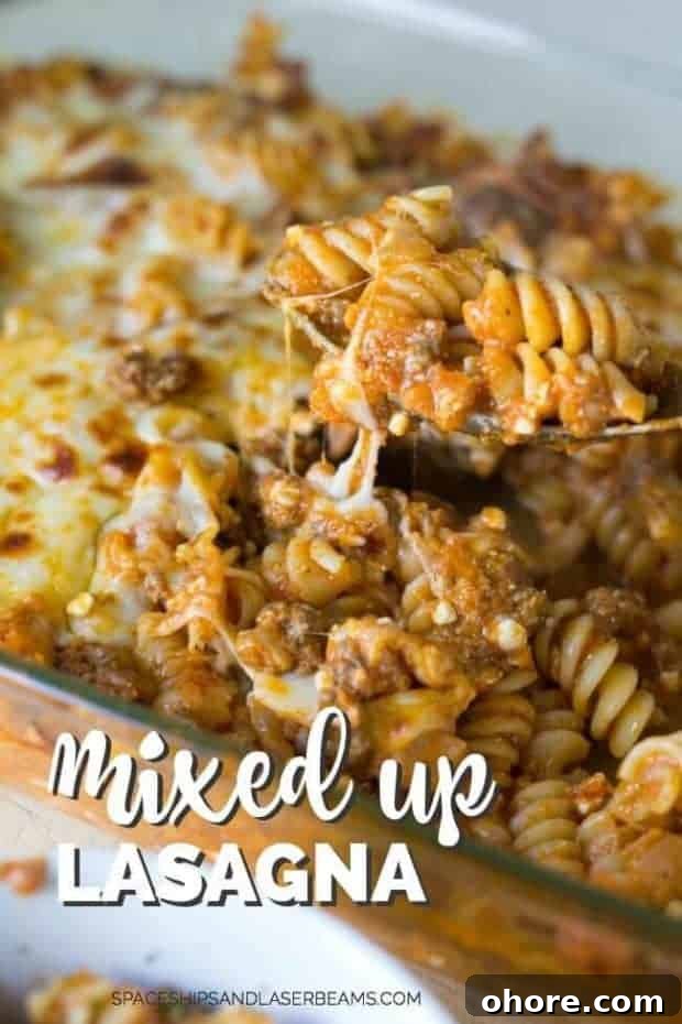Nutritious, Low-Cost Meals to Feed Homeless Shelters and the Hungry 3 A spoon lifting baked pasta with meat, red sauce and cheese fro dish