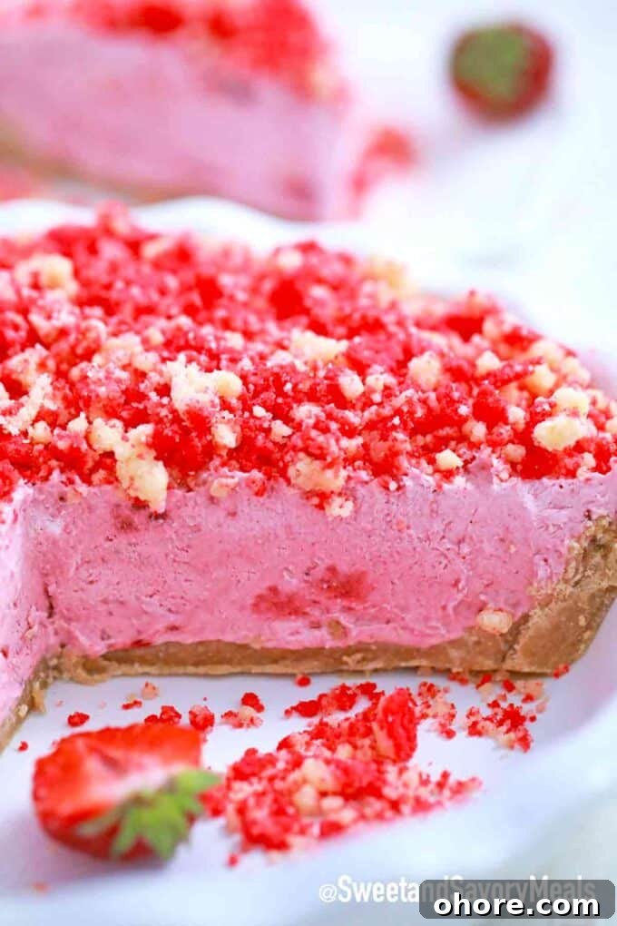 strawberry shortcake freezer pie sliced in a baking dish