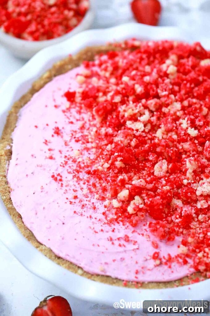 strawberry shortcake pie with strawberry crumbles on top
