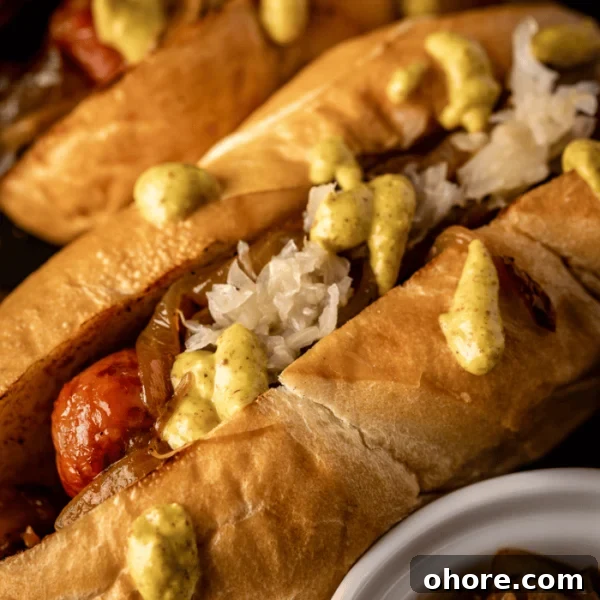 Perfectly Grilled Bratwurst: Juicy Sausage on the Grill 7 Smoked brats topped with beer onions and deli mustard.