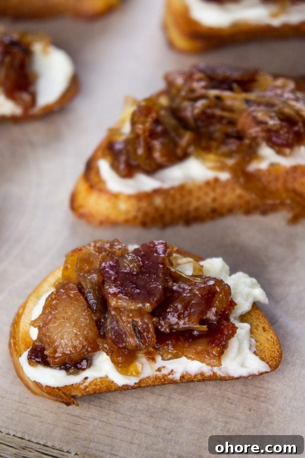 Savory Bacon Jam Crostini Recipe for Entertaining 5 two bacon jam crostini appetizers on parchment paper