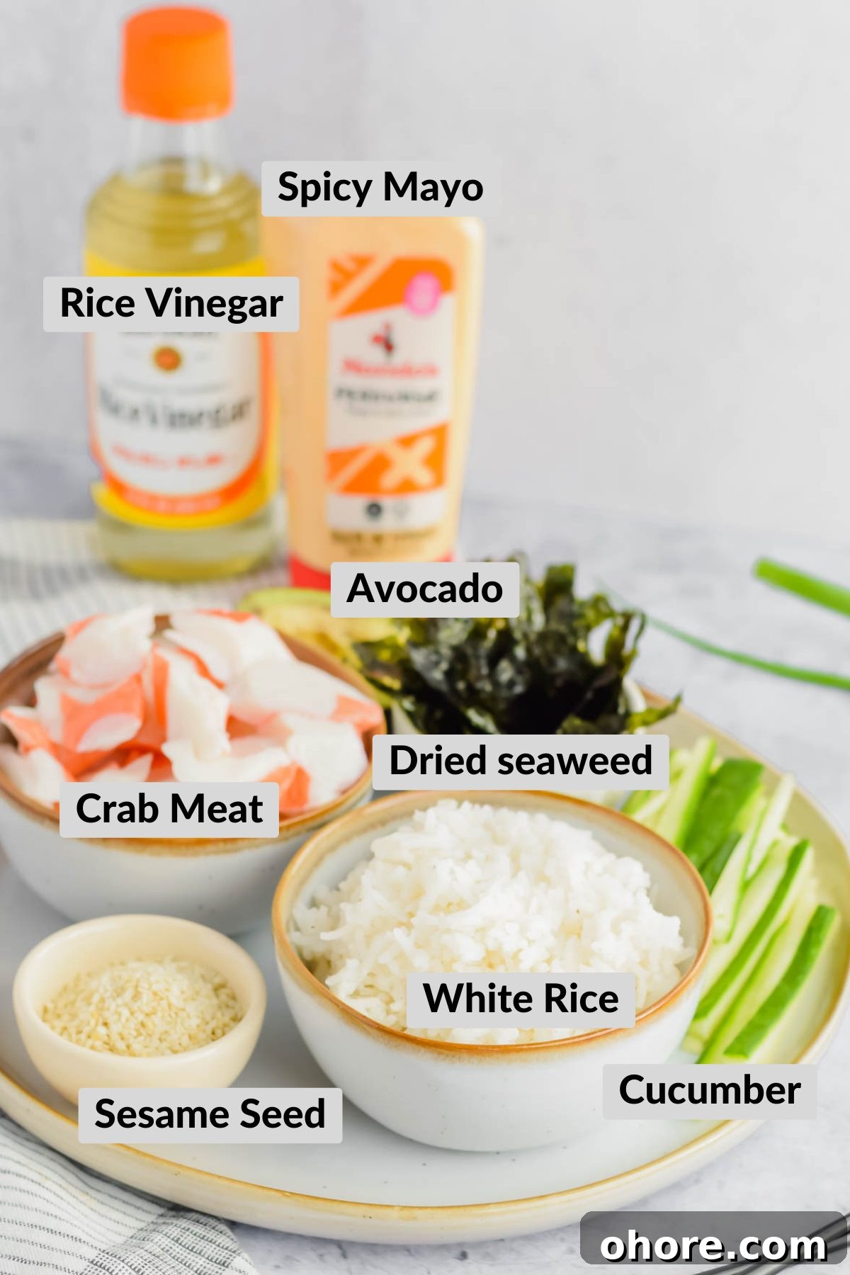 California Roll Bowl Recipe: Sushi-Inspired Deconstructed Bowl Guide 3 ingredients for california roll bowls separated on plate.