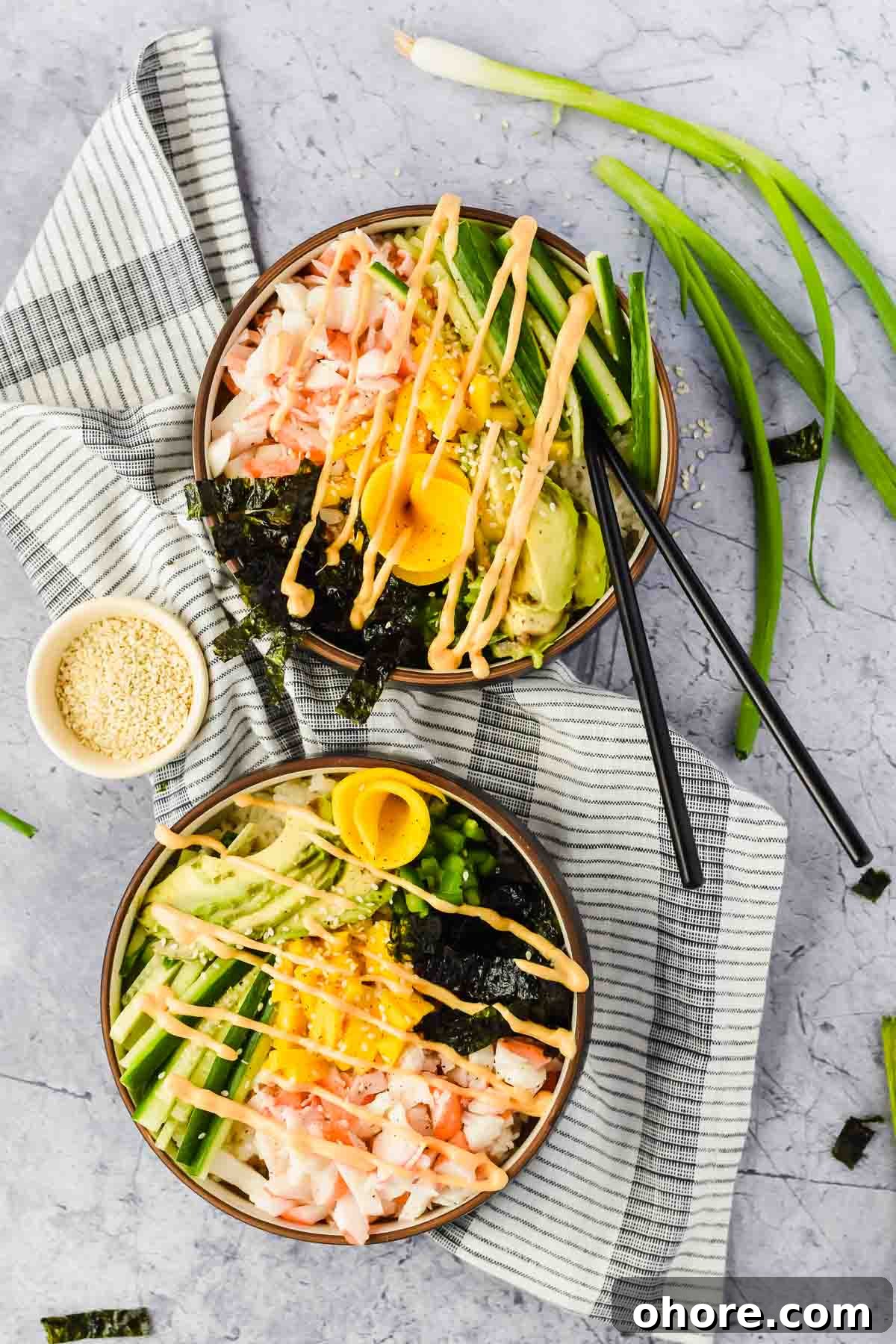 California Roll Bowl Recipe: Sushi-Inspired Deconstructed Bowl Guide 7 two california roll poke bowls drizzled with spicy mayo.