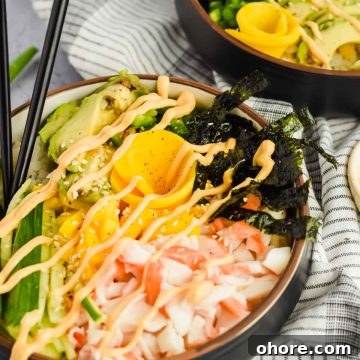 California Roll Bowl Recipe: Sushi-Inspired Deconstructed Bowl Guide 9 two california roll poke bowls drizzled with spicy mayo.